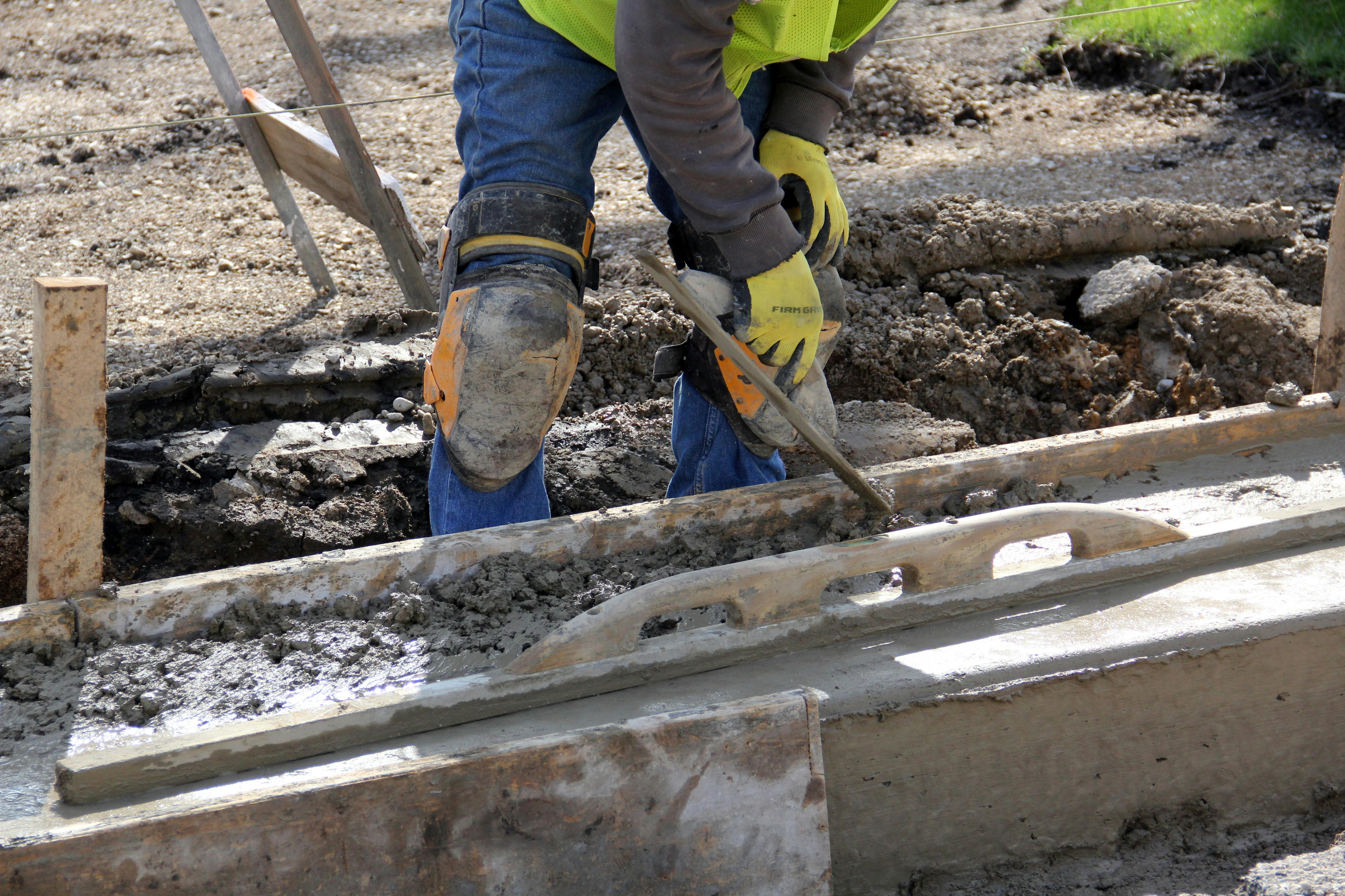 Concrete curbing and stormwater drainage structure installation